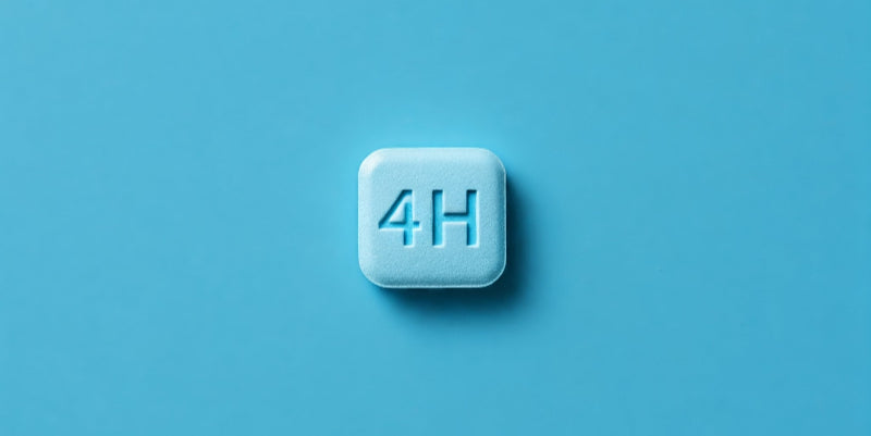 A single blue Sildenafil pill marked '4H,' symbolizing sexual health and performance. Designed for men seeking confidence and peak vitality, offered by Forty Health.